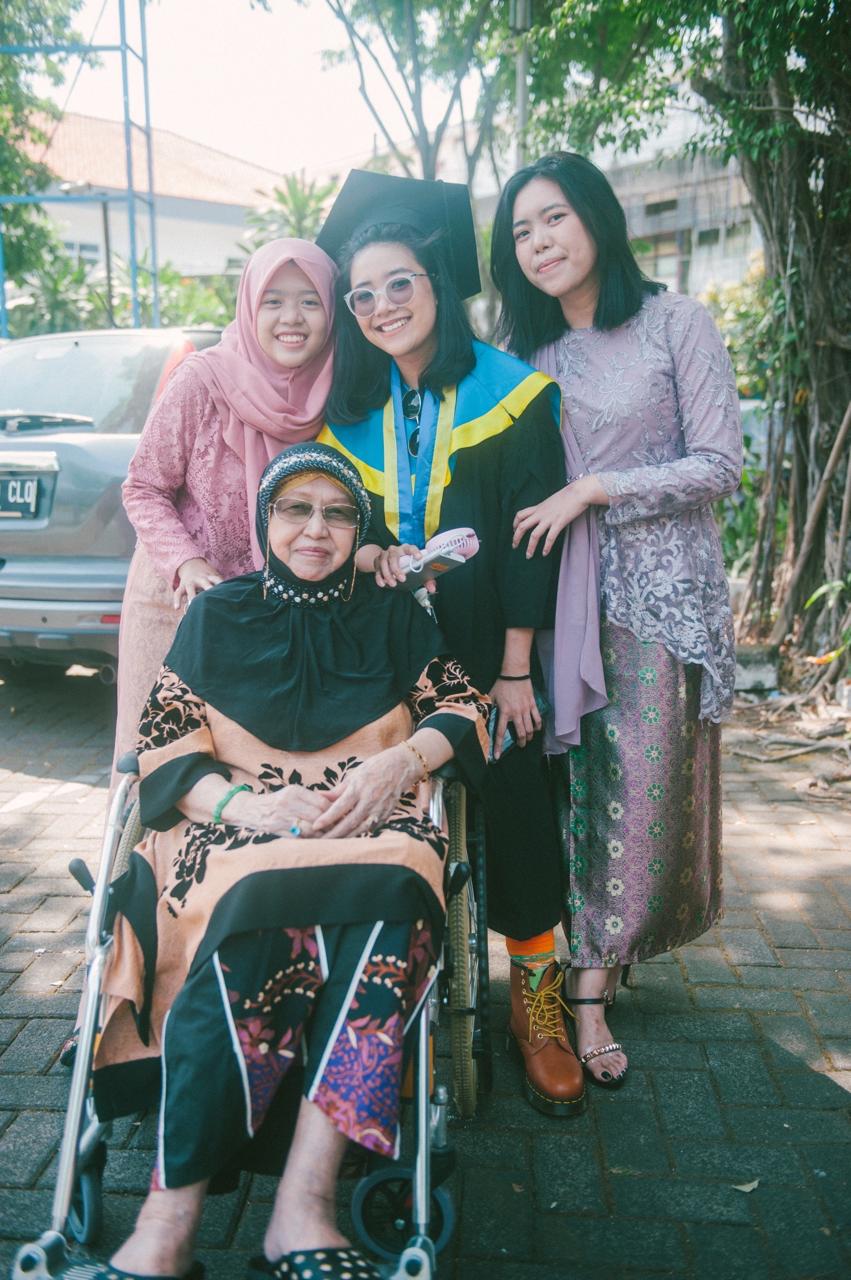 Grandma with family outside